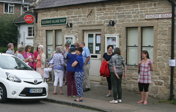 SWAG members and guests meet at the Village Community Shop