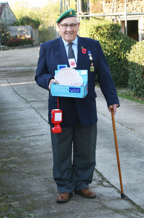 Ex-Serviceman Donald Taylor of Tow Rise selling poppies in the village